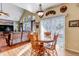 Cozy dining nook with a round table and chairs, adjacent to the kitchen at 6460 E 165Th Ct, Brighton, CO 80602