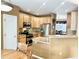 Kitchen boasts stainless steel appliances and light wood cabinets at 6460 E 165Th Ct, Brighton, CO 80602