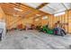 Large workshop with high ceilings, ample storage, and a loft area at 6460 E 165Th Ct, Brighton, CO 80602