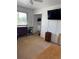 Bedroom featuring a window, closet and TV mounted on the wall at 4827 S Lewis Ct, Littleton, CO 80127