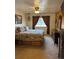 Bedroom featuring a comfortable bed and a ceiling fan at 4827 S Lewis Ct, Littleton, CO 80127