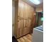 Practical laundry area with ample cabinet storage and modern washer and dryer units at 4827 S Lewis Ct, Littleton, CO 80127