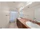 Bathroom featuring double sinks, granite countertops and a shower at 24394 E Dorado Pl, Aurora, CO 80016