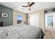 Bright bedroom with ceiling fan, closet, and view at 24394 E Dorado Pl, Aurora, CO 80016
