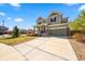 Inviting two-story home with a well-kept lawn and an extended driveway at 24394 E Dorado Pl, Aurora, CO 80016