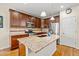 Modern kitchen with granite countertops, stainless steel appliances, and a center island at 24394 E Dorado Pl, Aurora, CO 80016