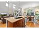 Open concept kitchen featuring granite countertops, stainless appliances, and eat-in dining area at 24394 E Dorado Pl, Aurora, CO 80016