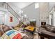 Comfortable living room with a fireplace, hardwood floors, and a staircase at 24394 E Dorado Pl, Aurora, CO 80016