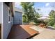 Backyard view showcasing a wooden deck, patio, and ample space at 4860 S Salida Ct, Aurora, CO 80015