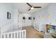 Bedroom with closet, white furniture, and ample natural light at 4860 S Salida Ct, Aurora, CO 80015