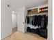 Spacious walk-in closet featuring built-in shelving and plenty of space for storage at 4860 S Salida Ct, Aurora, CO 80015
