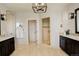 Spacious bathroom featuring a walk-in shower, dual sinks, and elegant tile work at 947 Buffalo Ridge Rd, Castle Pines, CO 80108