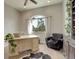 Bright home office featuring natural light, a comfortable chair, and hardwood flooring at 947 Buffalo Ridge Rd, Castle Pines, CO 80108