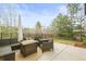 Outdoor patio area with comfortable seating and a modern fire pit, great for entertaining at 947 Buffalo Ridge Rd, Castle Pines, CO 80108