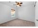 Bedroom with window, ceiling fan and carpet at 9770 Mayfair St # C, Englewood, CO 80112