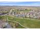 Golf course community, showcasing lush green fairways and meticulously landscaped homes at 13420 Lafayette St, Thornton, CO 80241