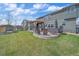 Large backyard features outdoor seating, a hot tub, a shed, and play equipment at 13420 Lafayette St, Thornton, CO 80241