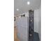 Modern bathroom shower with designer tile, gold fixtures, and a rainfall showerhead at 13420 Lafayette St, Thornton, CO 80241