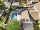 Aerial view of home with pool, hot tub, patio, and backyard at 751 Poplar St, Denver, CO 80220