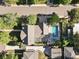 An aerial view of the property showing the home, pool, backyard, and landscaping at 751 Poplar St, Denver, CO 80220