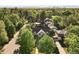 Stunning aerial view of home surrounded by lush trees at 751 Poplar St, Denver, CO 80220