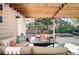 Backyard with outdoor lounge area, a fire pit, pool, and spa; great for relaxing at 751 Poplar St, Denver, CO 80220