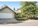 Charming home with a two-car garage and well-manicured lawn at 751 Poplar St, Denver, CO 80220
