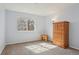 Comfortable bedroom with large closet, a soft carpet, and plenty of sunlight, offering a peaceful ambiance at 1795 S Pitkin St # B, Aurora, CO 80017
