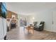 Comfortable living area with stone fireplace, sliding glass doors and modern furnishings at 1795 S Pitkin St # B, Aurora, CO 80017