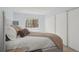 Comfortable bedroom with a large window, soft lighting, and ample closet space, offering a serene retreat at 1795 S Pitkin St # B, Aurora, CO 80017
