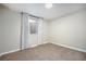 Spacious basement bedroom with carpeted floors and window at 6062 Garrison St, Arvada, CO 80004