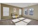 Bright bedroom with neutral walls and carpeting at 9760 Mayfair St # A, Englewood, CO 80112