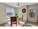 Dining area with balcony access and natural light at 9760 Mayfair St # A, Englewood, CO 80112