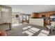 Open living area with kitchen and dining space at 9760 Mayfair St # A, Englewood, CO 80112