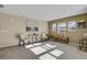 Spacious living area with seating and natural light at 9760 Mayfair St # A, Englewood, CO 80112