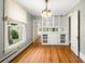 Classic dining area featuring hardwood floors, built-in cabinets, and great natural light at 130 S Humboldt St, Denver, CO 80209