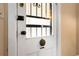 Charming front door with decorative hardware and glass insert, welcoming guests at 130 S Humboldt St, Denver, CO 80209