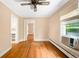 Bright living room offering hardwood floors, neutral walls and convenient access to the kitchen at 130 S Humboldt St, Denver, CO 80209