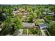 A bird's eye view displays a well-manicured lawn and a welcoming facade of this lovely single-Gathering home at 6410 Independence Way, Arvada, CO 80004