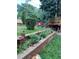 The backyard with a play area, landscape and patio is perfect for Gathering fun and outdoor relaxation at 6410 Independence Way, Arvada, CO 80004