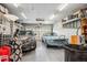 Spacious garage with epoxy flooring and ample room for two cars and storage at 6410 Independence Way, Arvada, CO 80004
