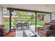 Outdoor patio featuring comfortable seating and a view of the landscaped backyard at 6410 Independence Way, Arvada, CO 80004