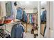 Walk-in closet providing ample storage with shelves and hanging space for organization at 6410 Independence Way, Arvada, CO 80004