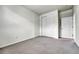 Empty bedroom with carpet and a closet at 7277 W Adriatic Cir, Lakewood, CO 80227