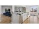 Spacious kitchen island with seating and modern stainless steel appliances at 2111 S Franklin St, Denver, CO 80210