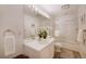 Clean bathroom with a large mirror and shower-tub combo at 160 Bristlecone Way, Boulder, CO 80304