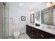 Bathroom with double sinks, a marble countertop, modern cabinets, and a separate shower at 160 Bristlecone Way, Boulder, CO 80304