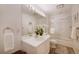 Bright and clean bathroom with a shower-tub combo and vanity at 160 Bristlecone Way, Boulder, CO 80304