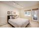Cozy bedroom with a plush bed, soft carpet, and a door to the backyard at 160 Bristlecone Way, Boulder, CO 80304