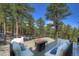 Spacious deck with stunning forest views, providing a serene and private outdoor retreat at 160 Bristlecone Way, Boulder, CO 80304